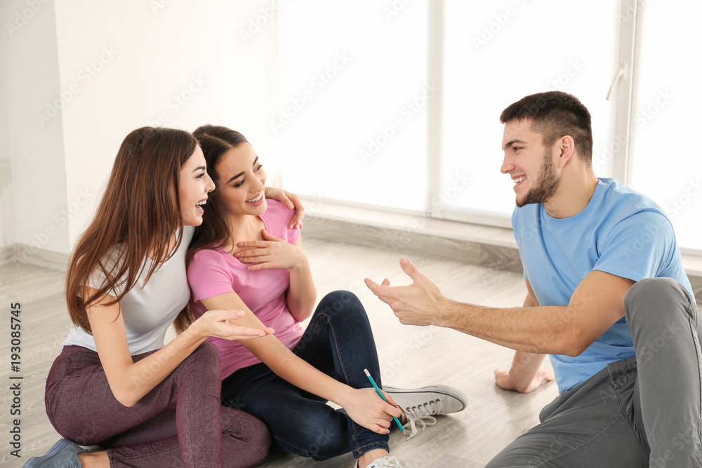 Fototapeta premium Young people spending time together indoors. Unity concept