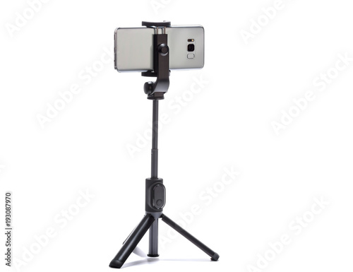 smart phone and tripod isolated on white background