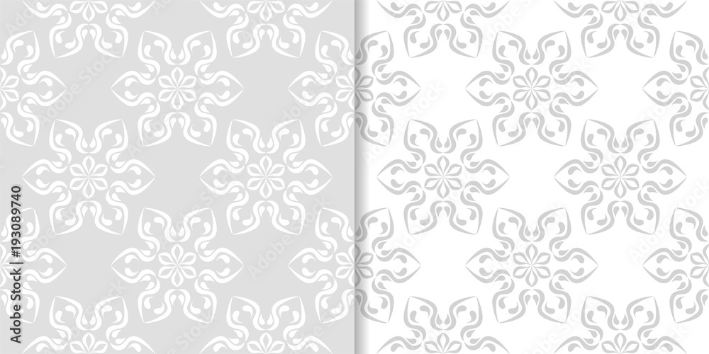 Fototapeta premium Light gray floral backgrounds. Set of seamless patterns