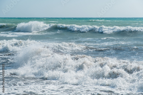 Waves rolling on the sea to the shore. Storm power on the sea.