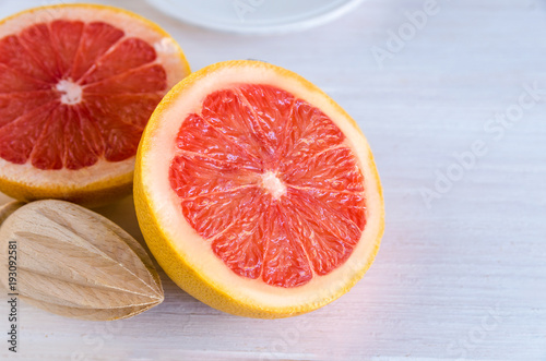 Close up of grapefruit fruit often include in weight loss programs .Healthy fruit background.