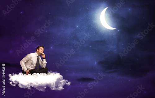 Man sitting on cloud
