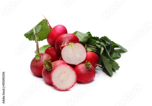 Fresh red radishes with slices with leaves isolated on white background, raphanus raphanistrum, sativus