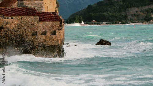 The old city in the Adriatic Sea big waves photo