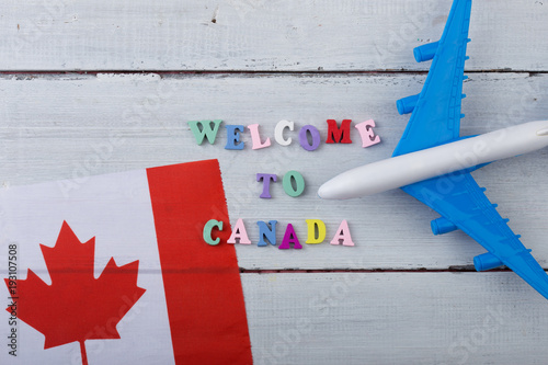 Photography Travel time - colorful wooden letters with text Welcome to Canada , flag of th