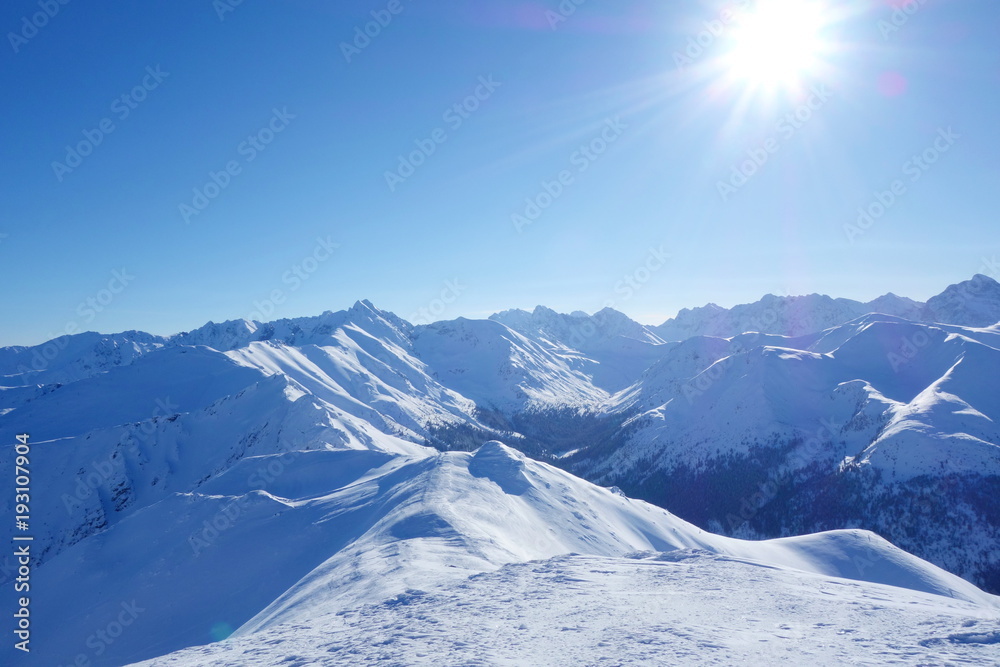 Fototapeta premium Top of Kopa Kondracka during winter with a view on Kasproway Wierch, Zakopane, Tatry mountains, Poland