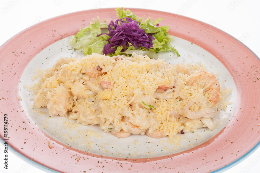 mediterranean food, dish of seafood stew covered with parmesan cheese mediterranean food, dish of seafood stew covered with parmesan cheese