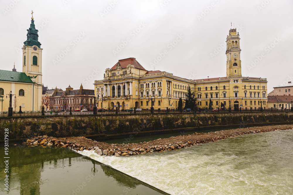 Fototapeta premium Union square (Piata Unirii) seen at the rainy day in Oradea, Romania (2018-02-10)