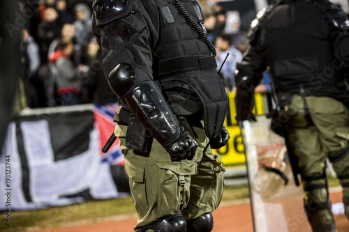 Special police unit at the stadium event secure a safe match against the hooligans