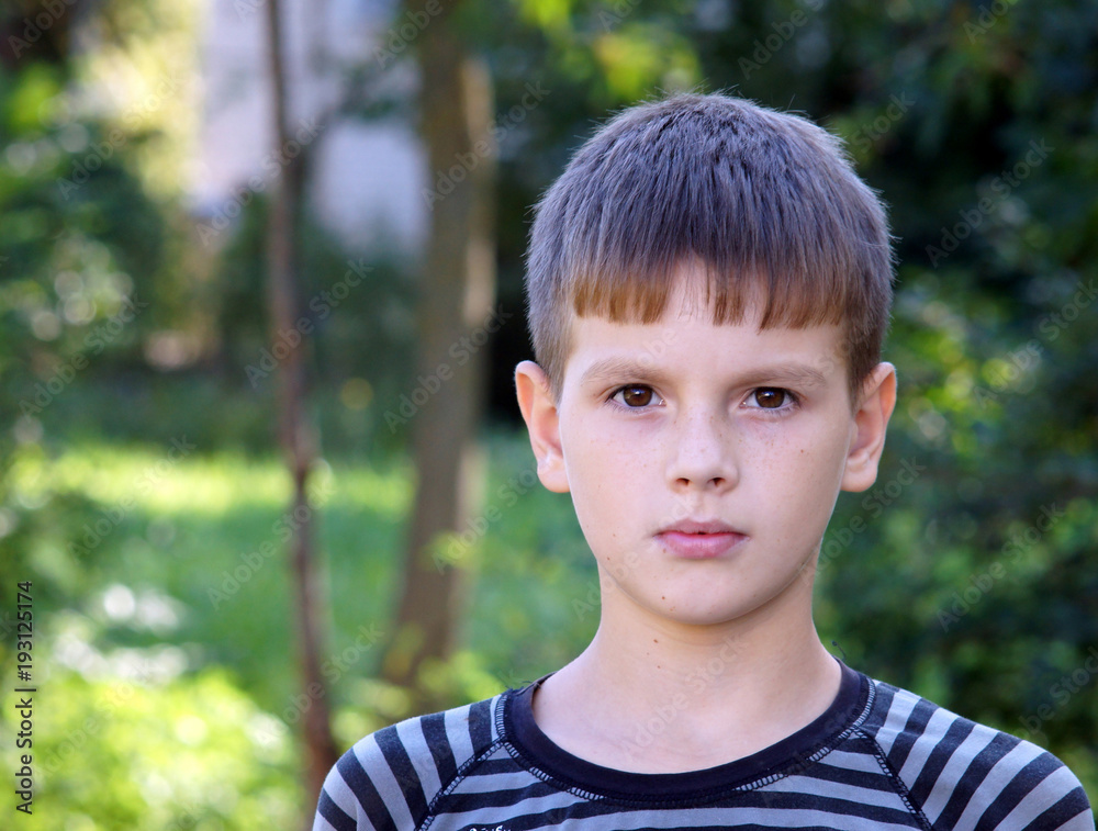 Portrait of a boy, a boy posing for a photographer