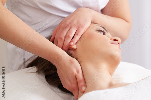 Wallpaper Mural Female Enjoying Relaxing face Massage In Cosmetology Spa Center Torontodigital.ca