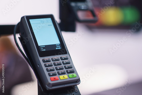 Принти на полотні modern wireless terminal for payment with a touch screen.