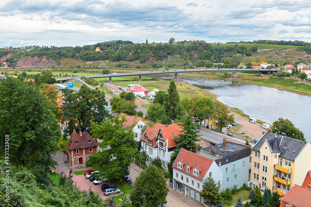 A view of the picturesque historical buildings along the Elbe River in Meissen, Germany.