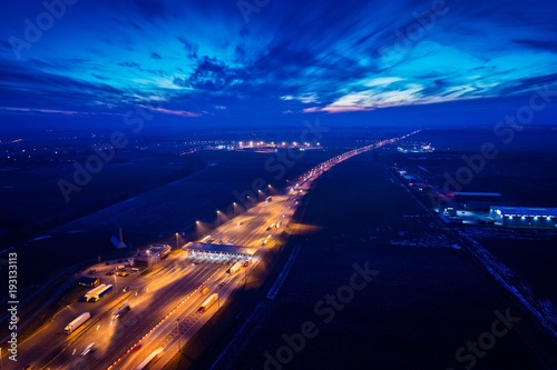 Aerial drone view on motorway with toll collection point