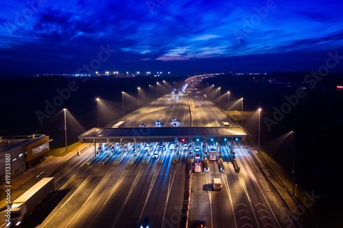 Aerial drone view on motorway with toll collection point photo
