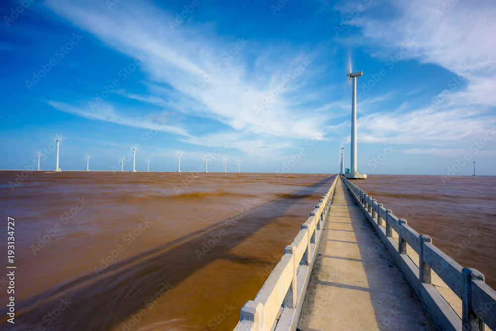 The wind turbines on the sea in Bac Lieu province, Vietnam.