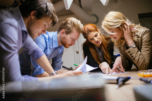 Creative workers designing and planing