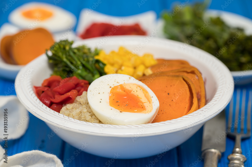 healthy bowl with vegetables and boiled egg