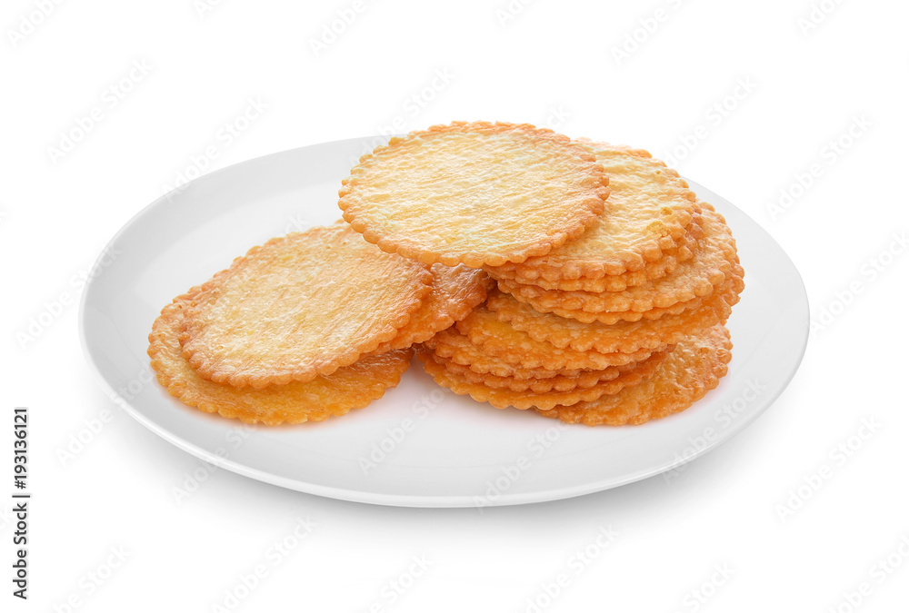 Cracker in plate isolated on white background Cracker in plate isolated on white background
