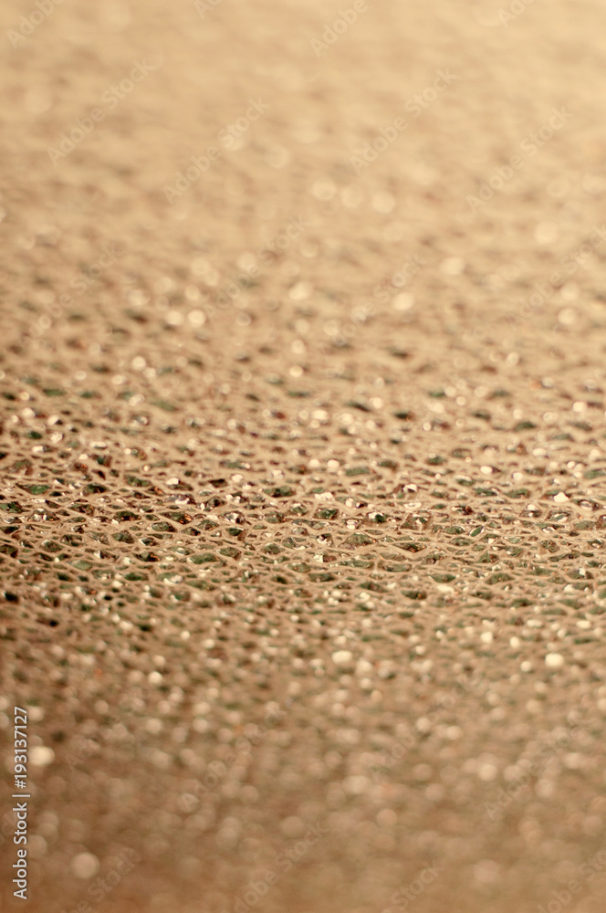 A festive beige bokeh background with space for text A festive beige bokeh background with space for text