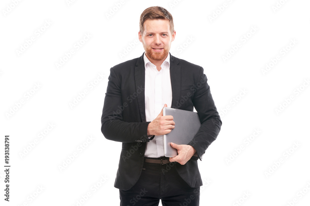 Studio portrait of young manager in suit holding laptop on white background Studio portrait of young manager in suit holding laptop on white background