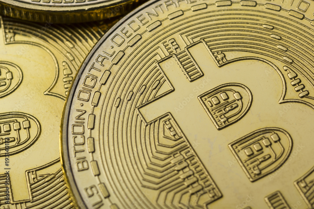 Bitcoin golden coin New virtual money and dollar background . Cryptocurrency. Business and Trading concept. Close-up shot