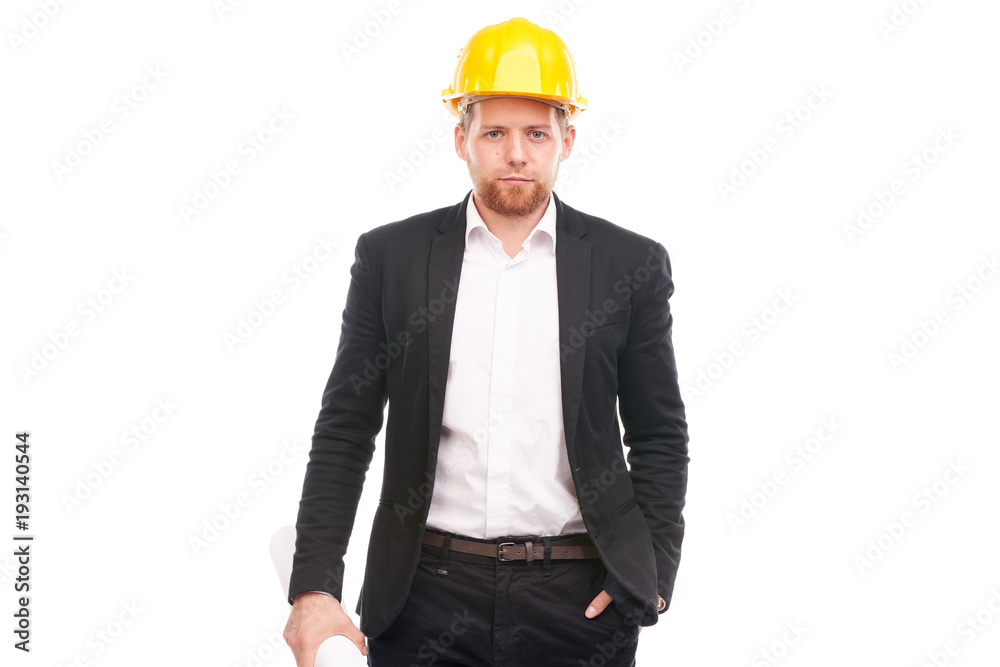 Portrait of architect wearing suit and yellow hardhat holding project plan on white background Portrait of architect wearing suit and yellow hardhat holding project plan on white background