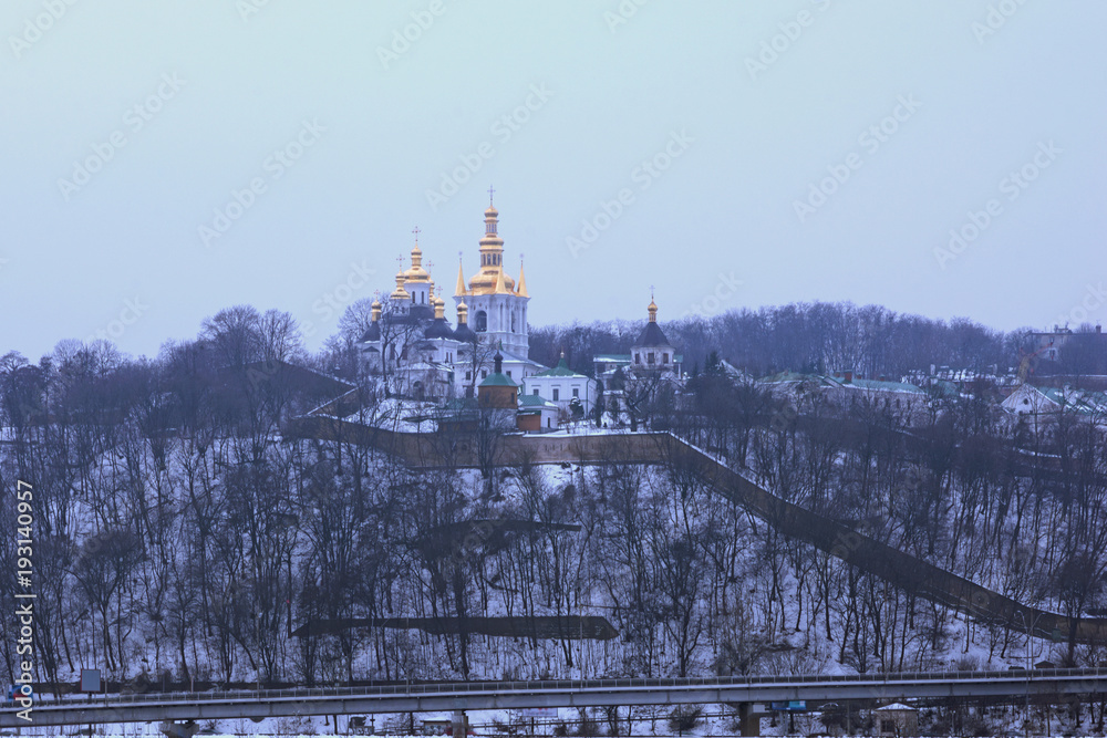 Winter view of one of the churches in Kyievo-Pechers'ka lavra. It is a historic Orthodox Christian monastery. Morning landscape photo. Kyiv, Ukraine