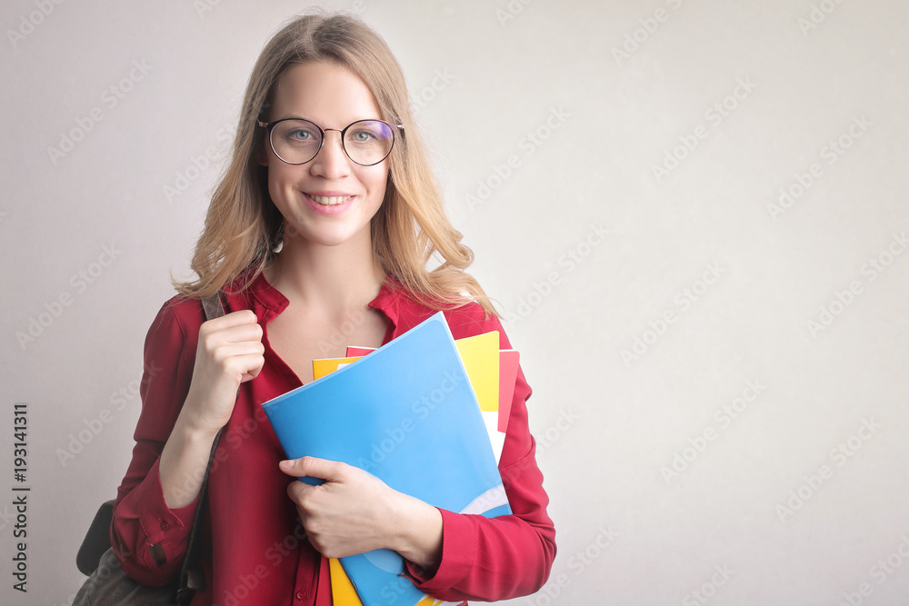 Cheerful smart student smiling Cheerful smart student smiling