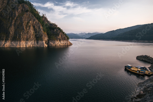 Local car ferry moored on lakeside, Draja, Vaslui, Romania photo
