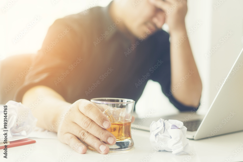 Concept of stress and frustration of a businessman with laptop Concept of stress and frustration of a businessman with laptop