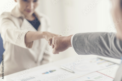 business people join hand w...