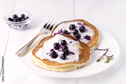 Pancakes Topped with Cream Cheese Honey and Blueberries on Plate White Background Homemade Tasty Pancakes Tasty Breakfast