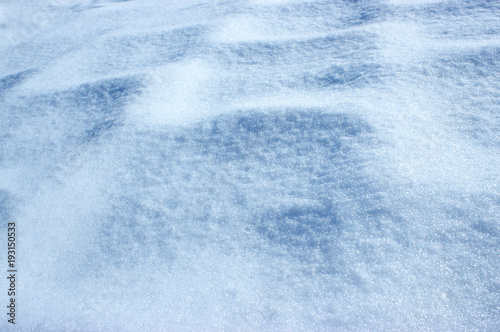 Background with snowy pavement with shadow