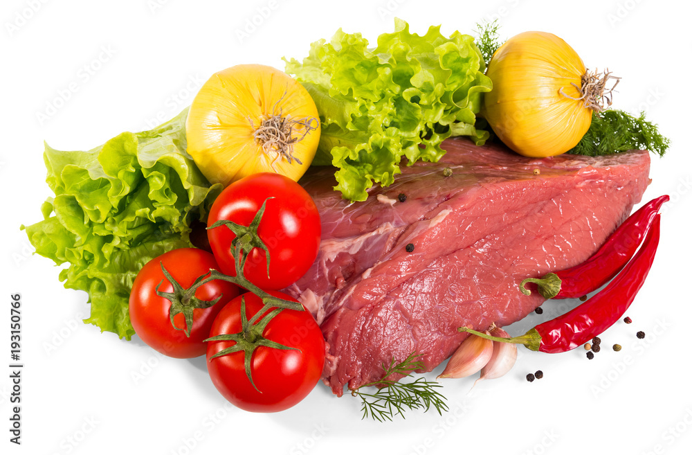 Piece of fresh veal, onion, pepper, garlic, top of lettuce leaf isolated on white Piece of fresh veal, onion, pepper, garlic, top of lettuce leaf isolated on white