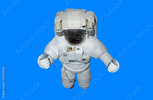 Fototapeta Naklejka Na Ścianę i Meble -  Astronaut isolated on blue background 3D rendering elements of this image furnished by NASA