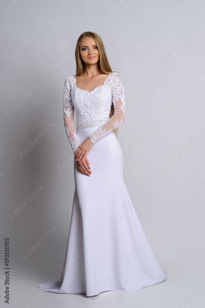 Beautiful bride in wedding dress, white background Beautiful bride in wedding dress, white background
