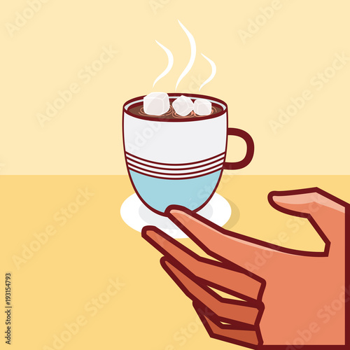 Hand holding coffee cup