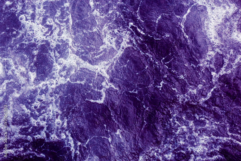 Naklejka premium Abstract purple background with waves and foam