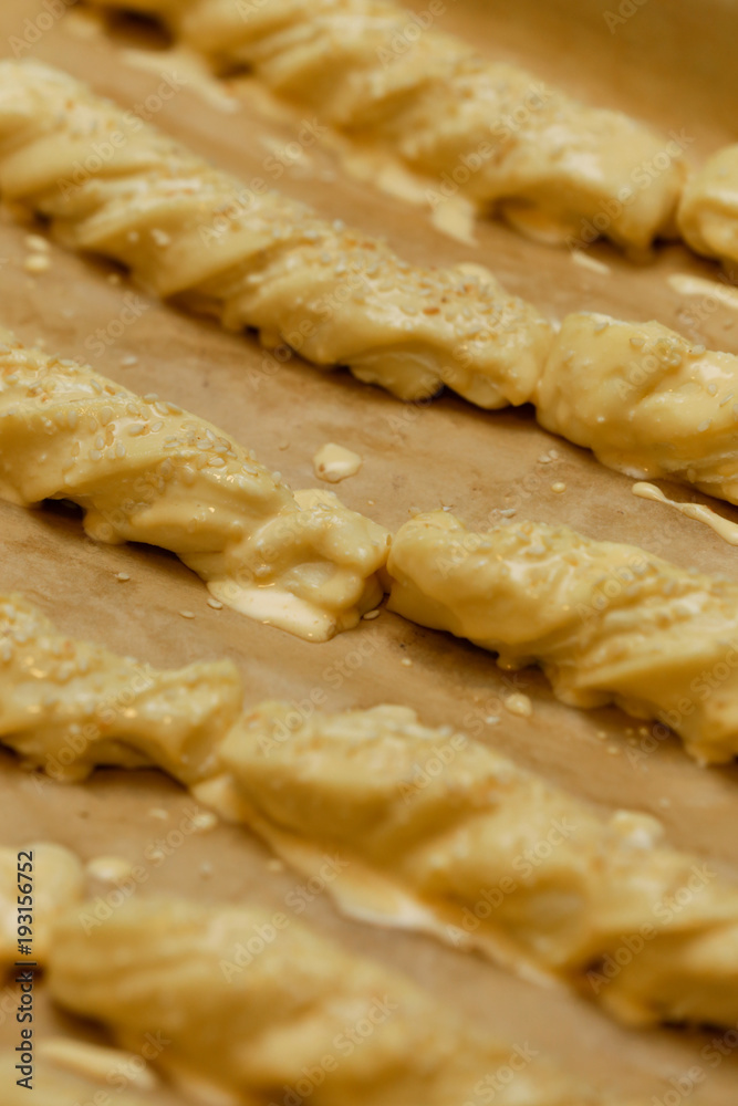 Pastry on the baking sheet, before baking Pastry on the baking sheet, before baking