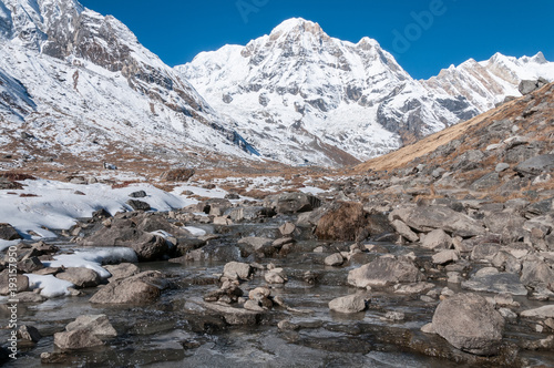 small stream in the himalayan mountains