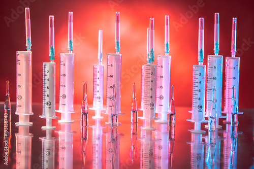 Syringes with needles. Glas...