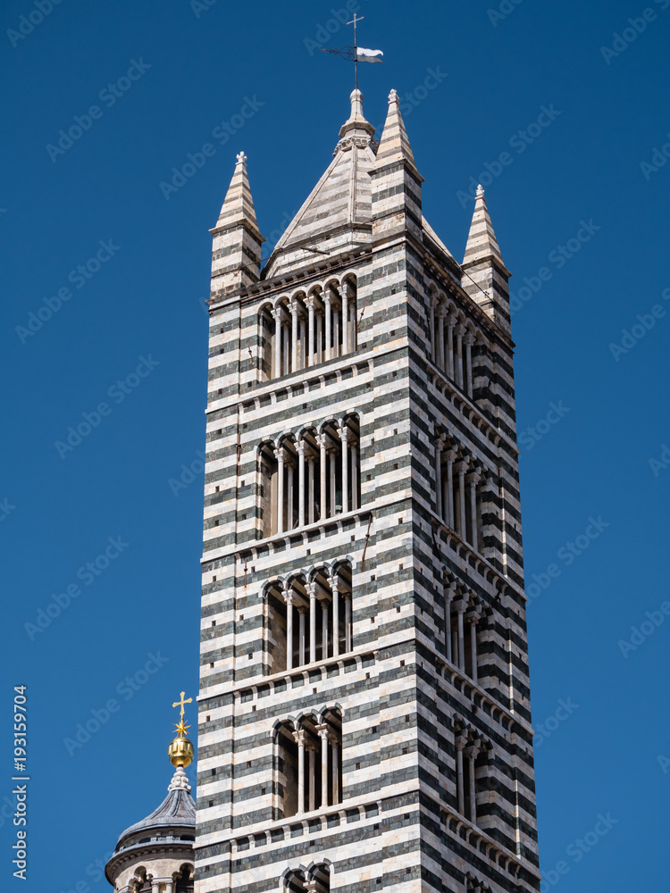 Black and white striped bell tower of Siena Cathedral