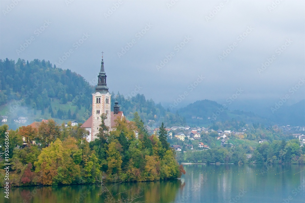 Landscape surrounding ancient baroque church on Bled Island in Slovenia