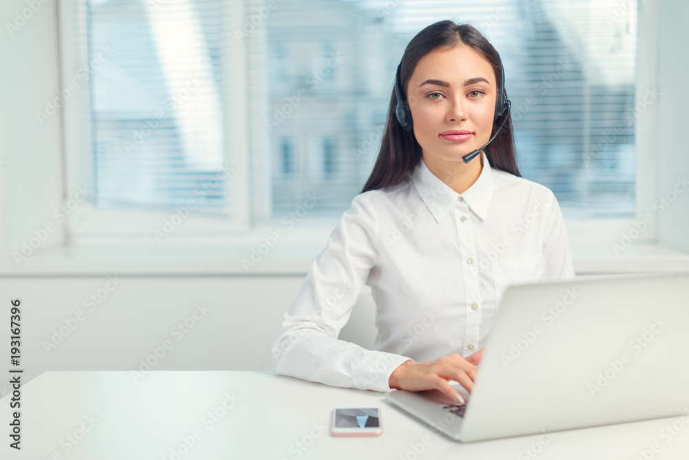 Support phone operator in headset at workplace Support phone operator in headset at workplace
