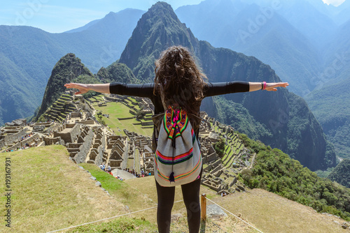 Woman looking at Machu Picchu, Peru