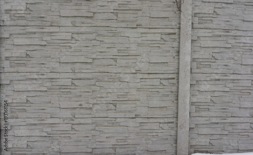 Stone fence. The masonry of...