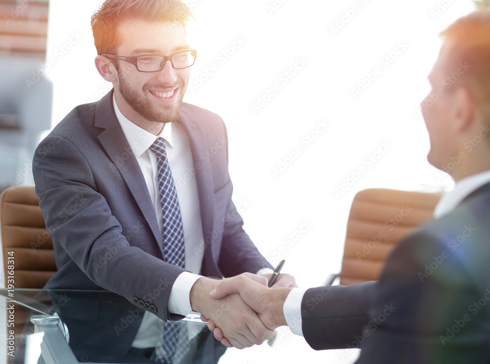 Fototapeta premium welcome and handshake business partners