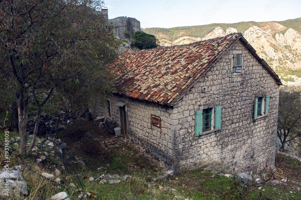 old stone house in the mountains