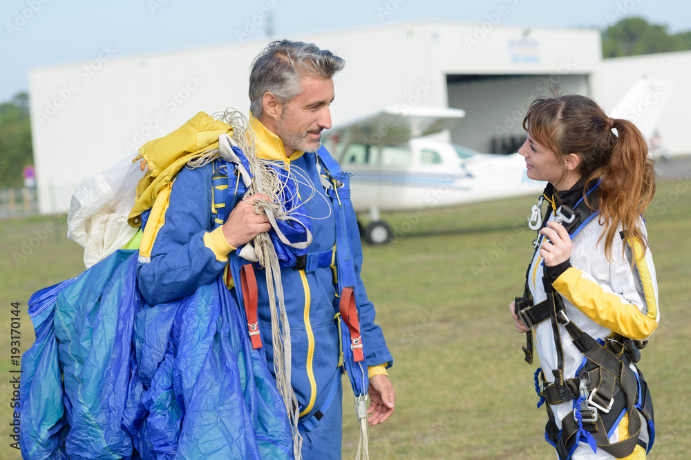 skydivers ready to jump